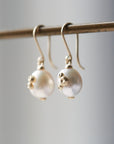 Pearl drop earrings with gold barnacles