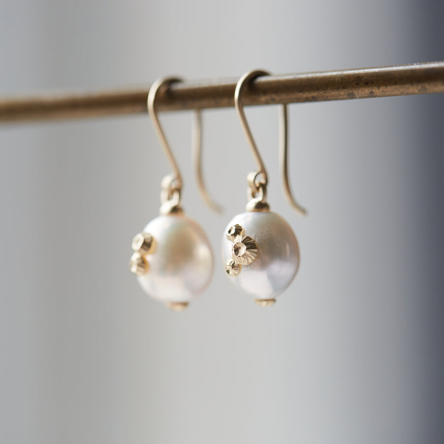 Pearl drop earrings with gold barnacles