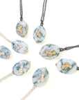 Indian opal necklaces with silver and oxidized silver chain and gold and silver barnacles by Hannah Blount