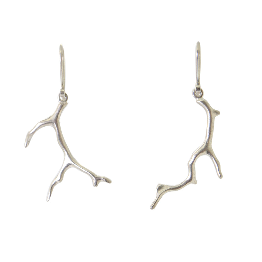 Silver Branch Coral Ruthie B. Earrings on white background.