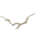 Branch Coral Ruthie B. Necklace on white background.