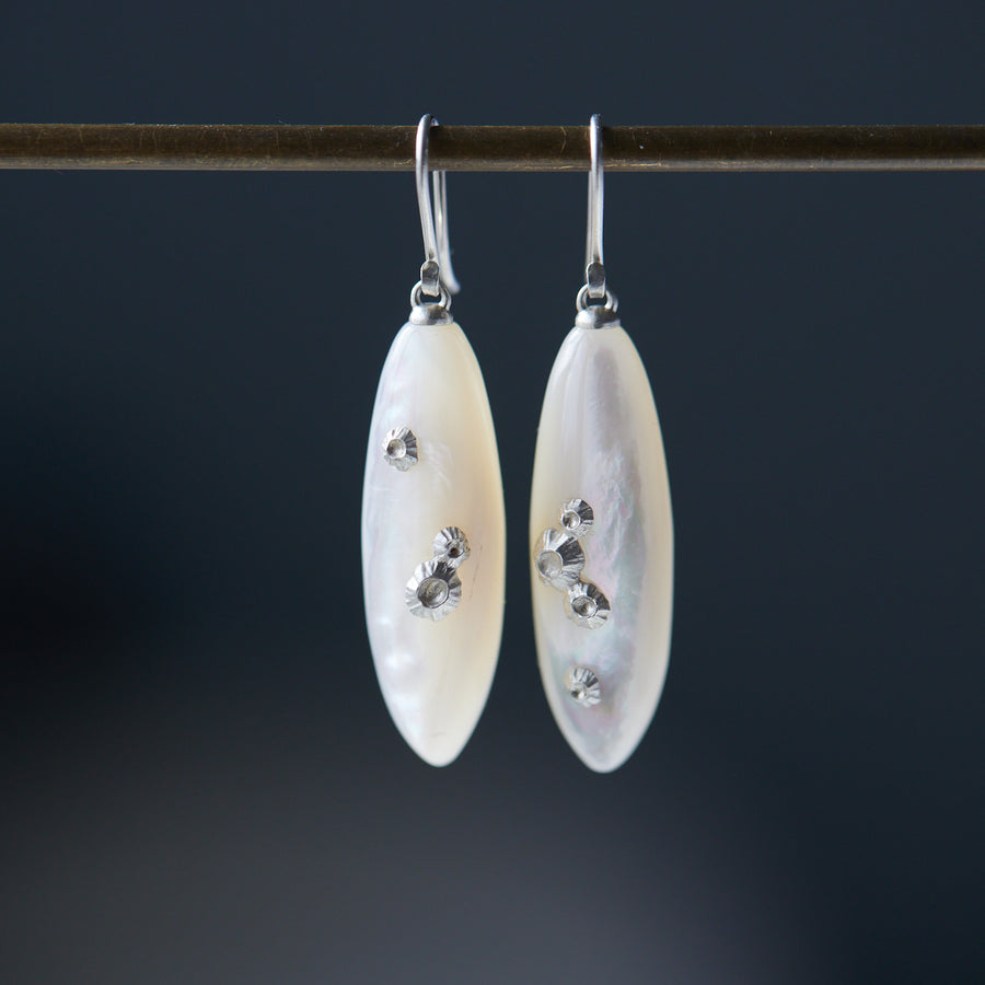 large sized mother of pearl drop earrings with silver barnacles