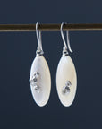 medium sized mother of pearl drop earrings with silver barnacles