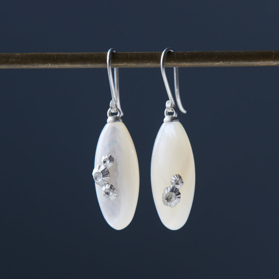 medium sized mother of pearl drop earrings with silver barnacles