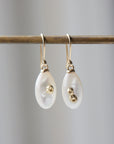 small sized mother of pearl drop earrings with gold barnacles