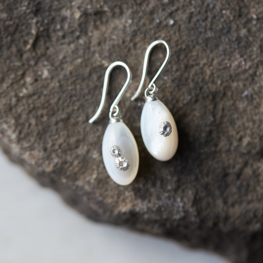 small sized mother of pearl drop earrings with silver barnacles