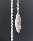 large sized mother of pearl pendant necklace in bright silver with barnacles