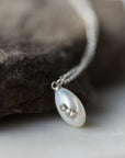 little sized mother of pearl pendant necklace in bright silver with barnacles