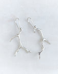 Two bright sterling silver branch coral earrings.