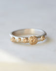 Silver ring with gold barnacles + diamond by Hannah Blount