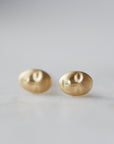 Cameo gold stud earring by Hannah Blount