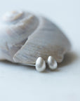 Egg studs in silver by Hannah Blount