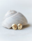 Gold cameo studs by Hannah Blount