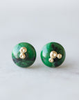 dark green garnet earring studs with gold barnacles