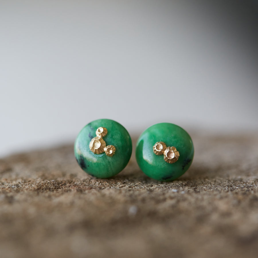 medium green garnet earring studs with gold barnacles