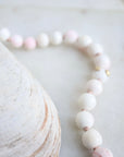 coral strand necklace with gold barnacles