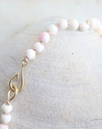 coral strand necklace with gold fish hook clasp