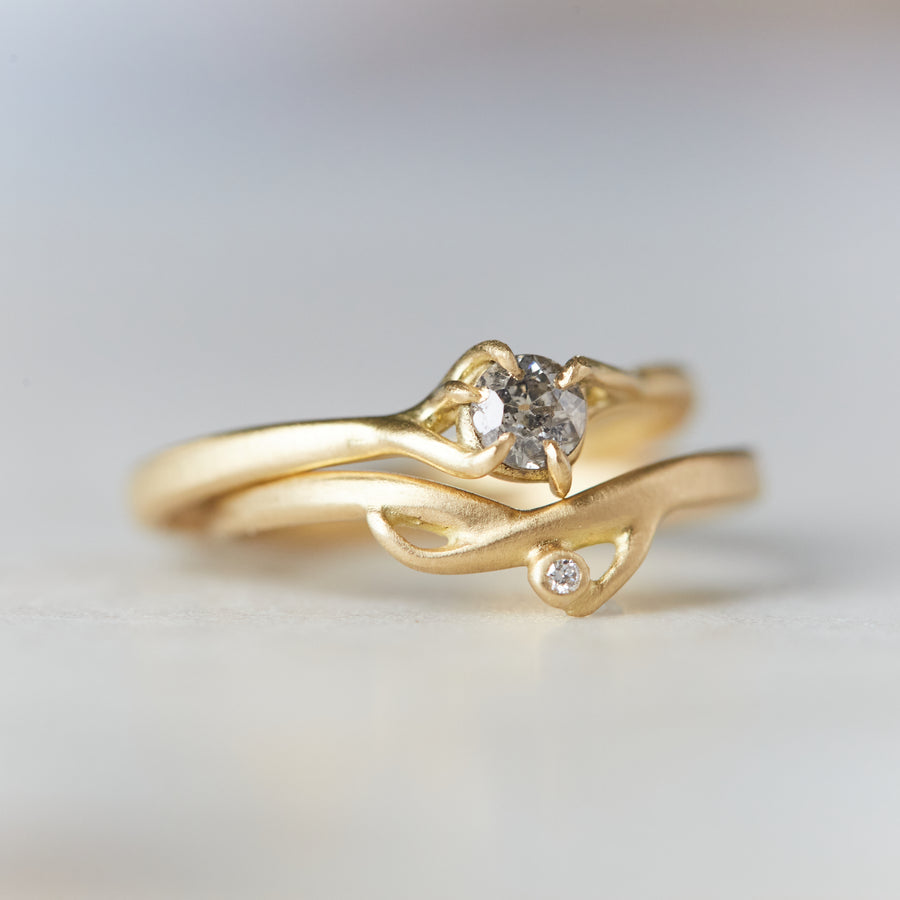 gold branch ring with little salt and pepper diamond, stacked with the little branch waiting ring with diamond. 18k yellow gold.