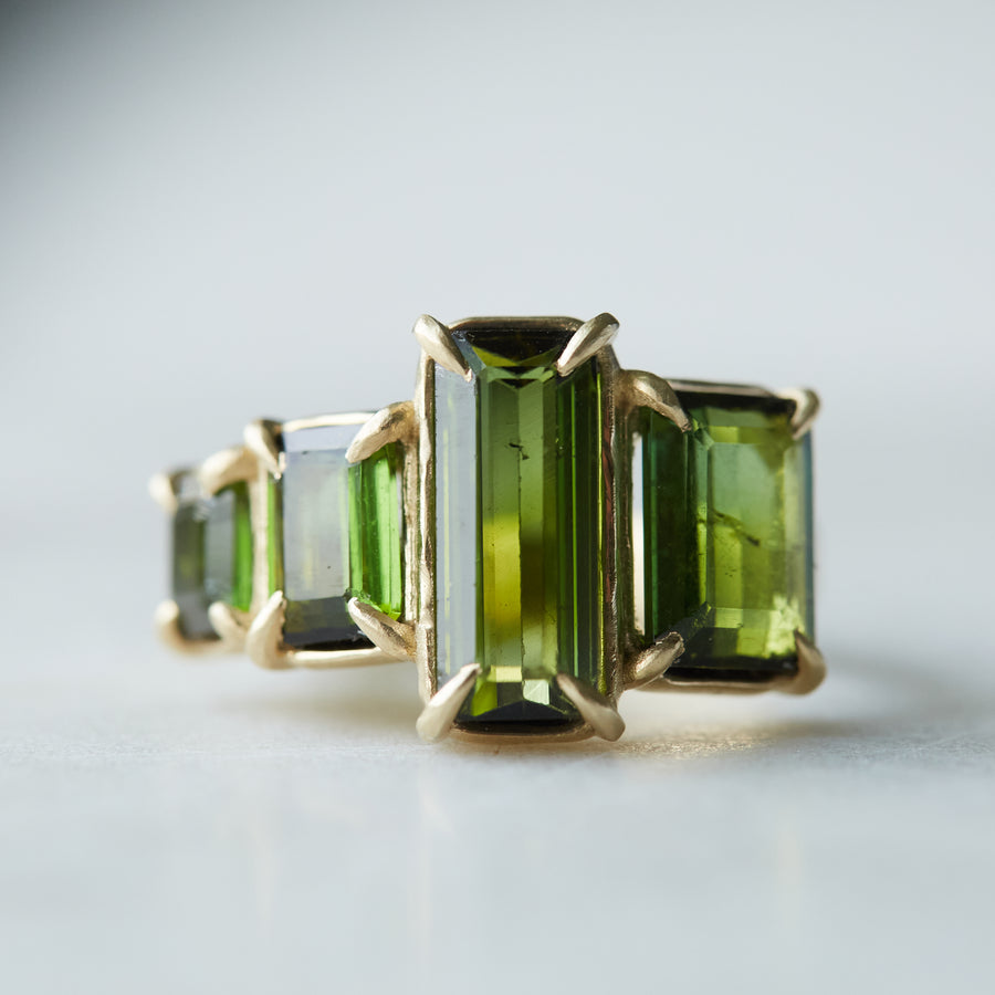 four stone green tourmaline and gold ring