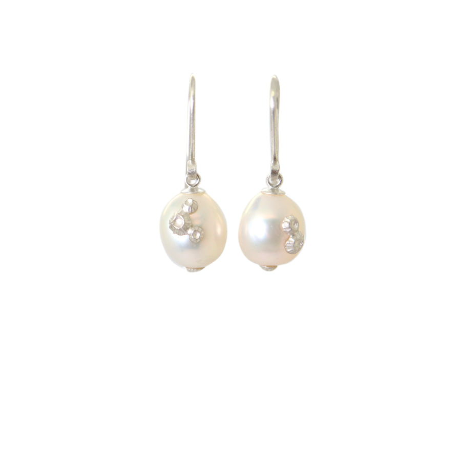 Pearl drop earrings with silver barnacles