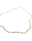 Freshwater pearls with coral thread