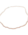 Freshwater pearls with coral thread