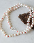 knotted freshwater pearls on coral silk