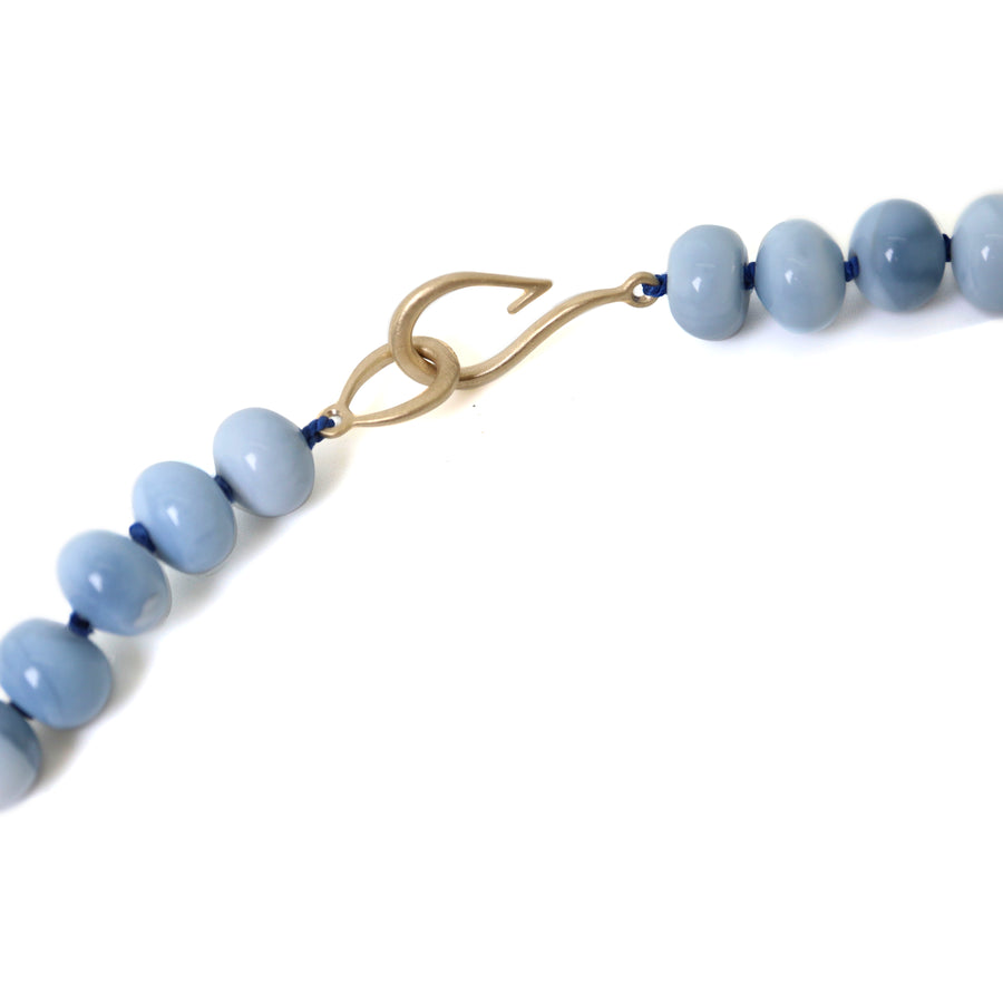 Blue opal strand necklace with gold clasp by Hannah Blount