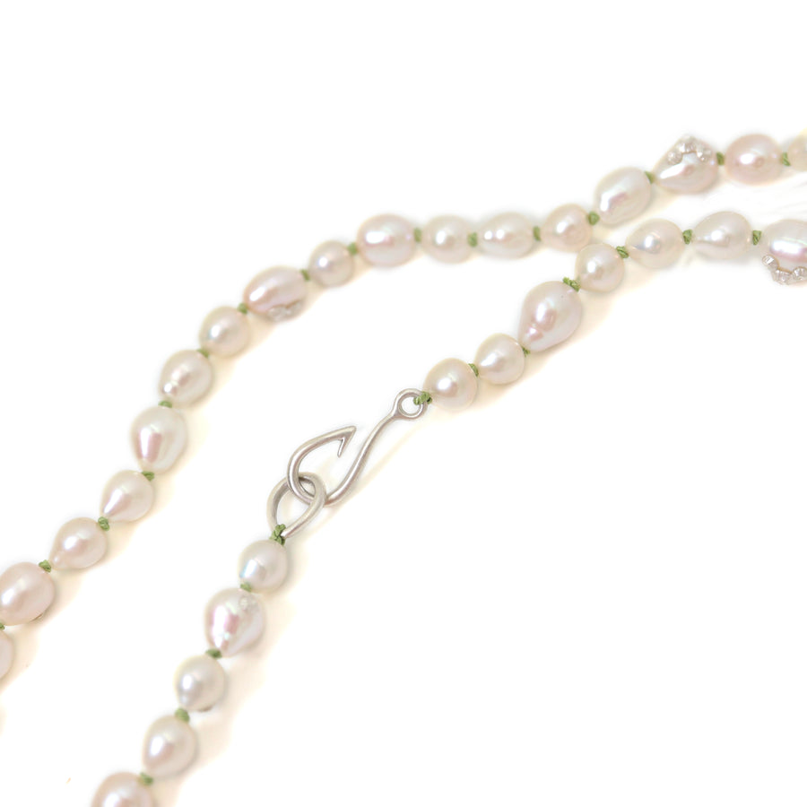 double pearl strand on green silk with silver barnacles