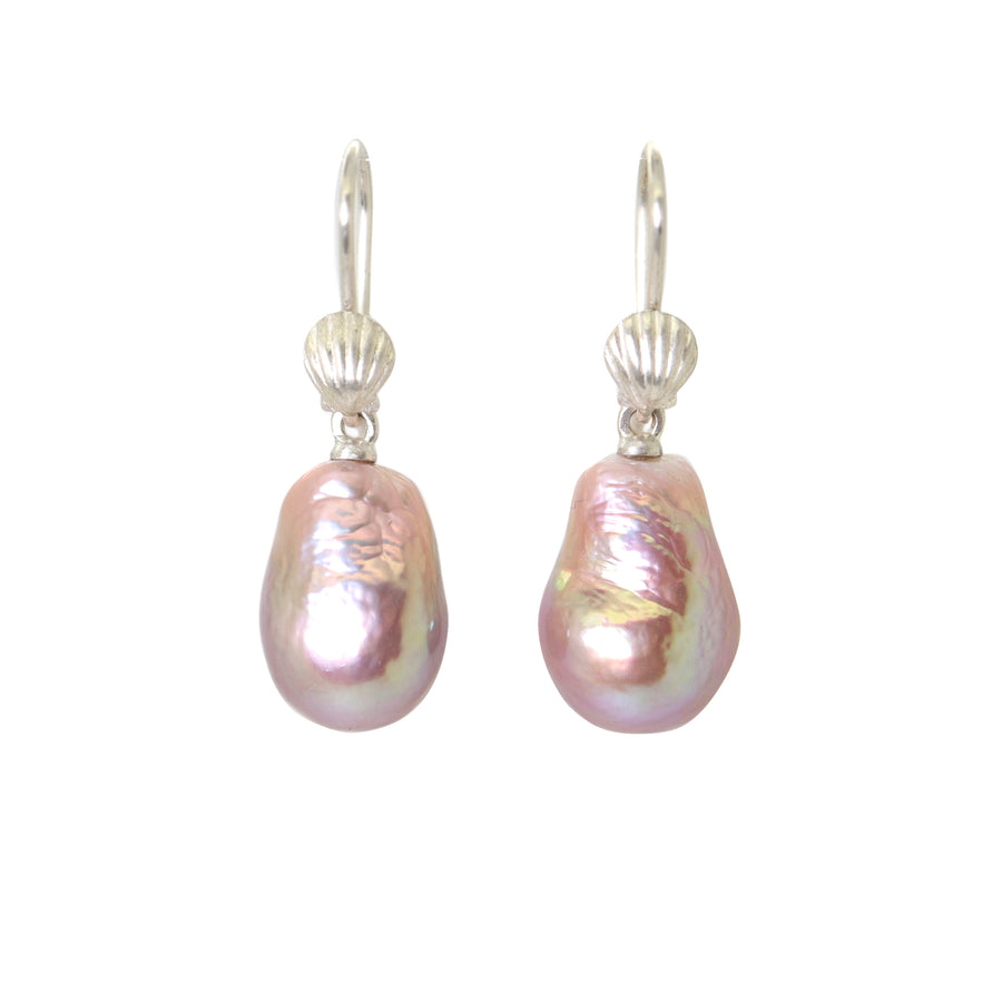 pink pearl drop earrings under silver scallop shells