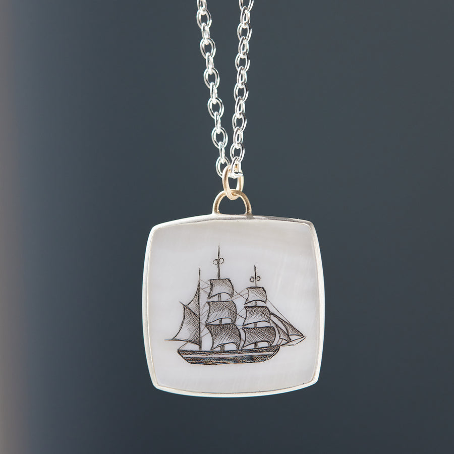 Scrimshaw ship on Mother of Pearl by Hannah Blount