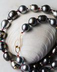 Tahitian pearl necklace with red silk thread