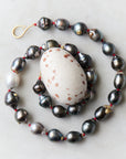 Tahitian pearl necklace with red string