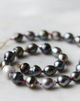 Tahitian pearl necklace with red string