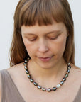 Tahitian pearl necklace with red string